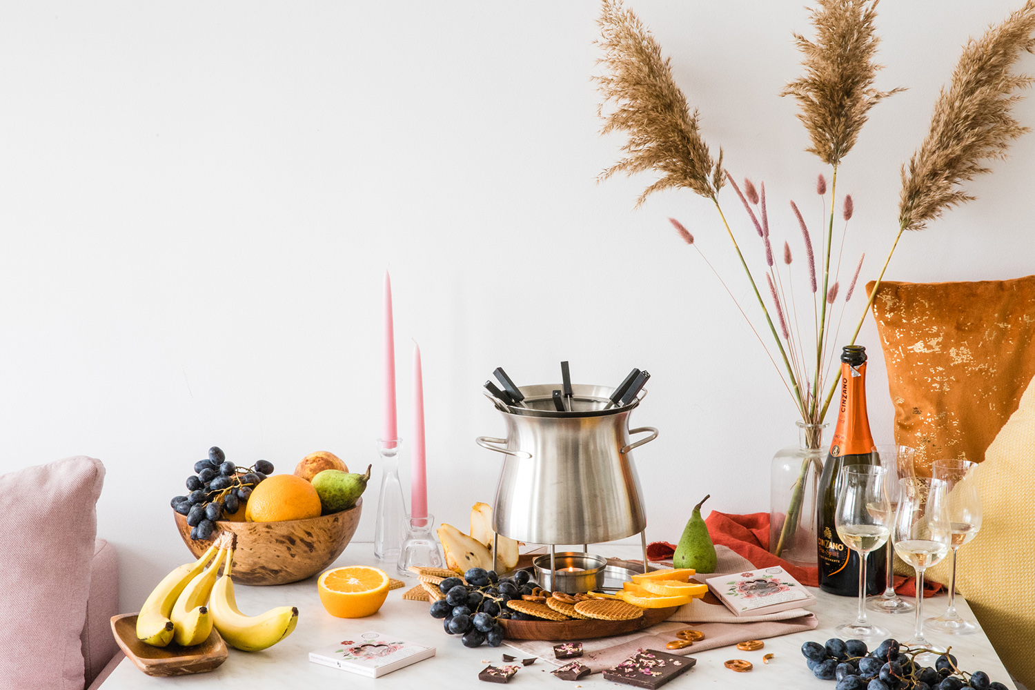 Chocolate fondue with roses and autumn bites